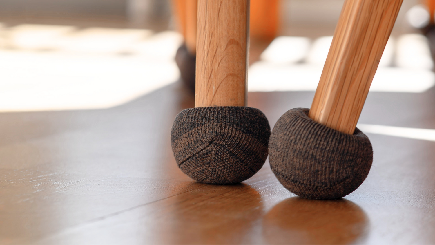 Silent Socks on wooden floor on wood chairs
